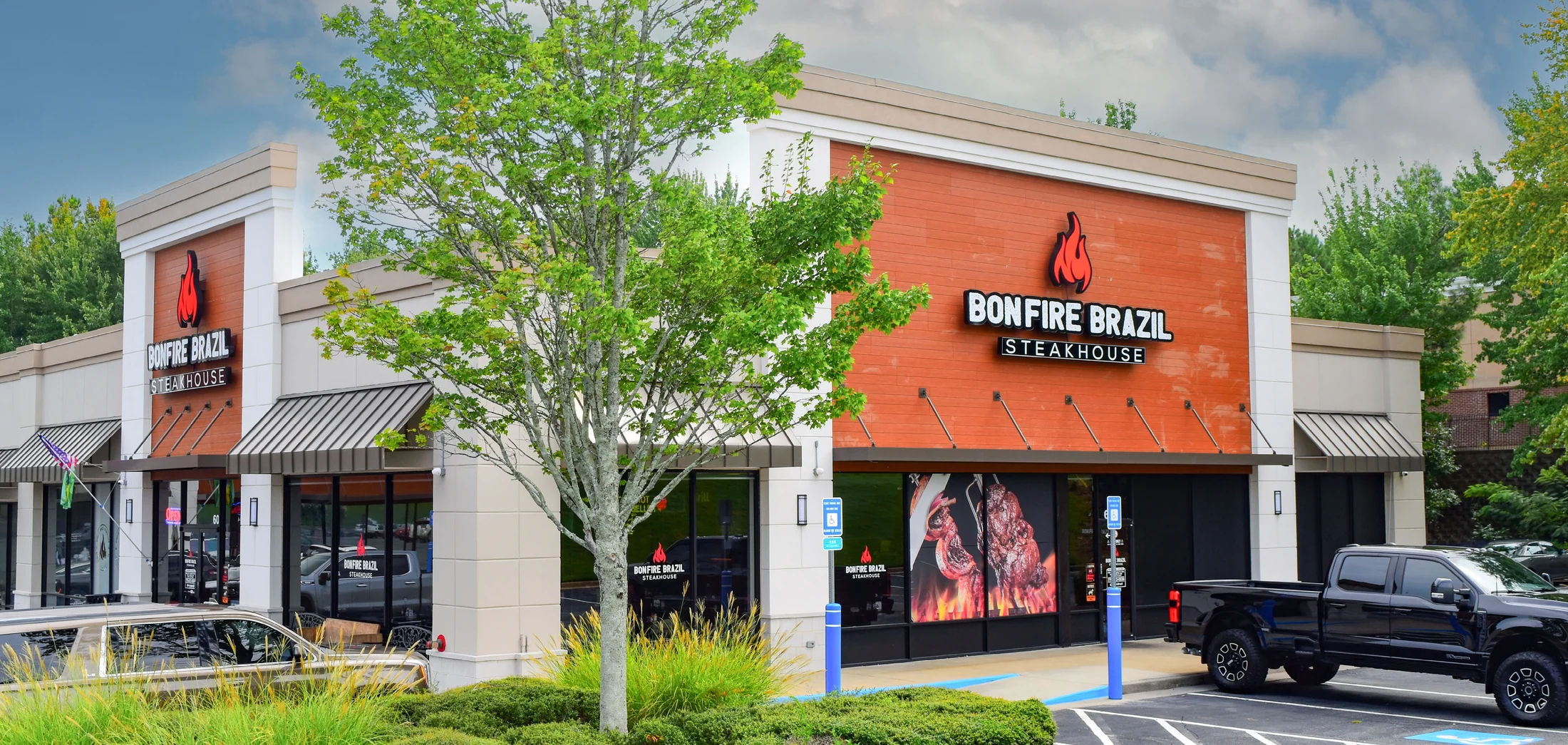 Exterior of The Shops at Shiloh Crossing with Bonfire Brazilian Steakhouse storefront